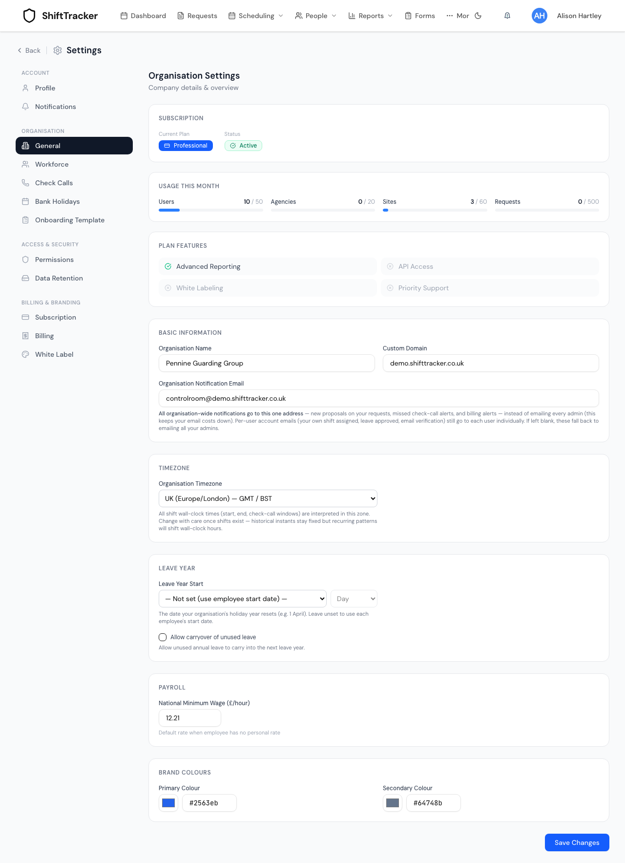 Settings → General for a demo organisation. A sidebar groups the pages under ACCOUNT, ORGANISATION, ACCESS & SECURITY and BILLING & BRANDING, with General selected. The panel runs top to bottom: a Professional plan badge marked Active; Usage This Month bars reading Users 10 / 50, Agencies 0 / 20, Sites 3 / 60, Requests 0 / 500; plan features; Organisation Name, Custom Domain and Organisation Notification Email; an Organisation Timezone menu on UK (Europe/London) — GMT / BST with the warning to change it with care once shifts exist; Leave Year Start unset; National Minimum Wage 12.21; and two brand colour swatches. A Save Changes button sits at the foot.